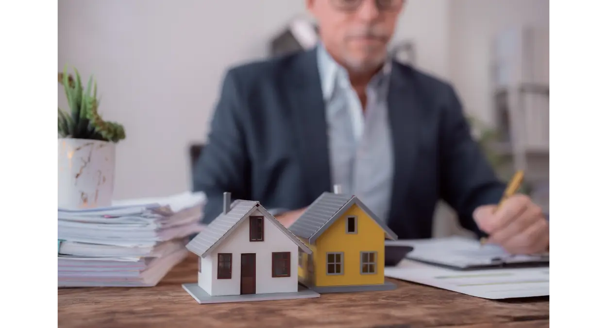 Homeowner reviewing roof insurance paperwork